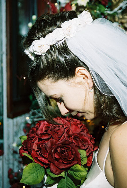 Picture of Bride smelling her Red Roses